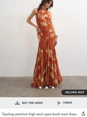 Topshop Premium high neck open back maxi dress from ASOS